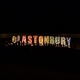 Glastonbury sign at night