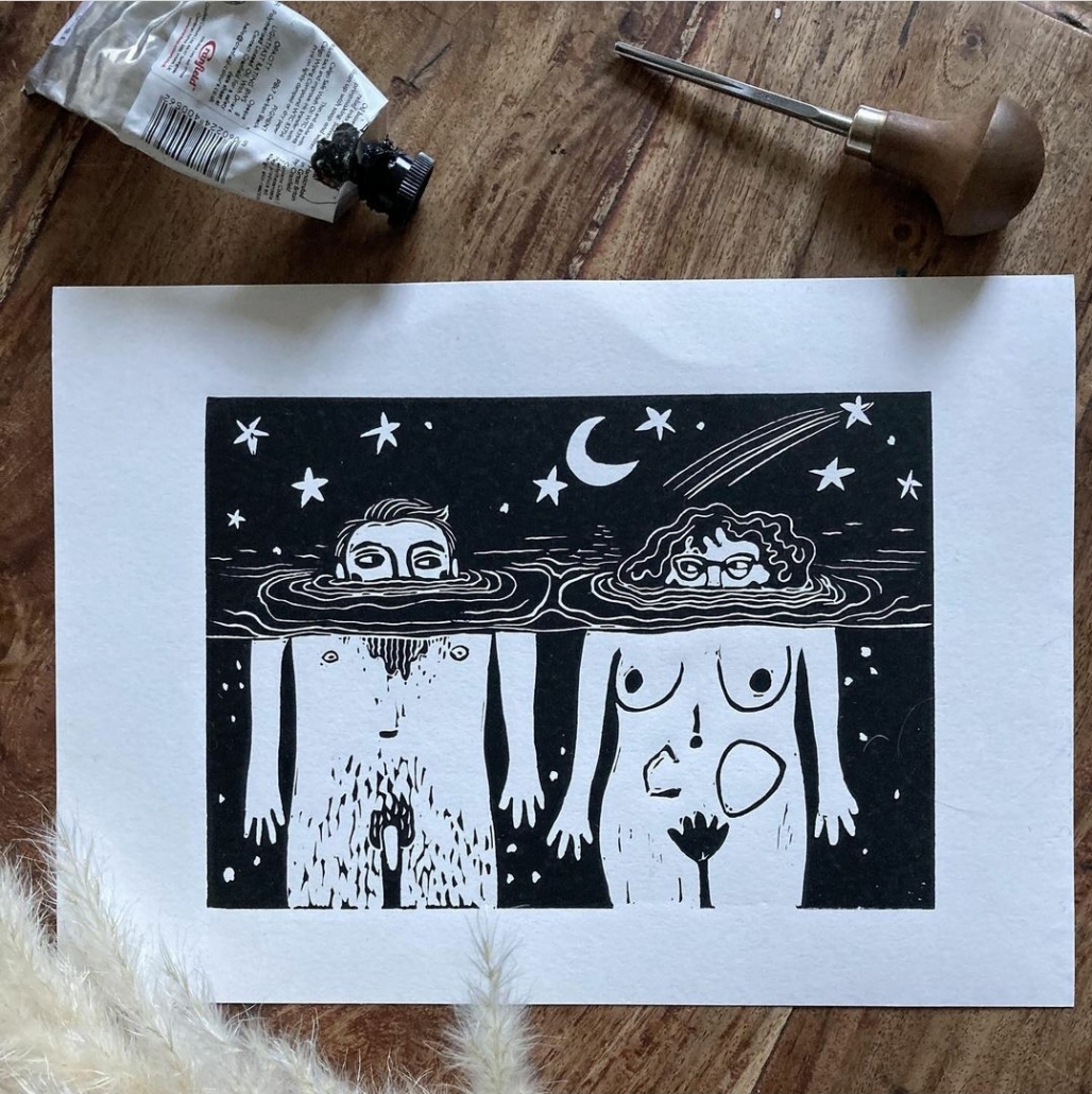 lino print of a man and woman skinny dipping and wild swimming in the night time